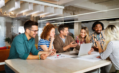 Fototapeta premium Successful group of designers, business people at work in office