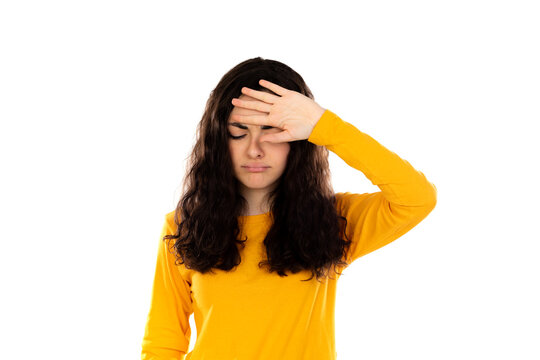 Adorable teenage girl with yellow sweater