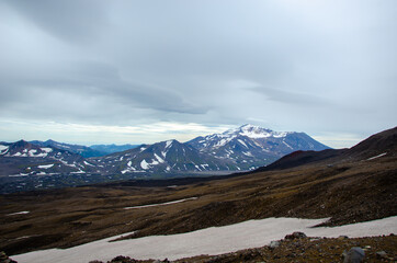 Landscape with Snow and Clouds. Russia, Kamchatka 2020. Photo taken during an expedition to the volcano.