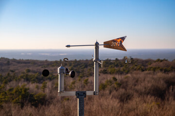 Rauen, Brandenburg, Germany - February 21, 2021 Weather station at the observation tower in the Rauener Berge with construction date.