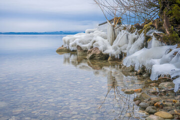 Frozen landing stage on Chiemsee in winter