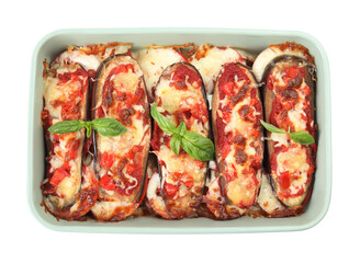 Baked eggplant with tomatoes, cheese and basil in dishware isolated on white, top view
