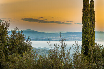 A shot from Grand hotel la Florida in the Barcelona mountains. the fog is covering a nice valley.