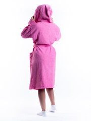 woman in a dressing gown from the back on an isolated white background.