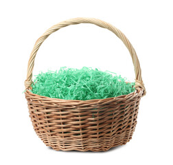 Easter basket with green paper filler isolated on white