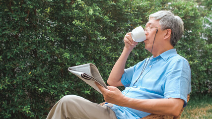 Asian senior men relax at home. Asian Senior Chinese male enjoy rest time wear glasses read...