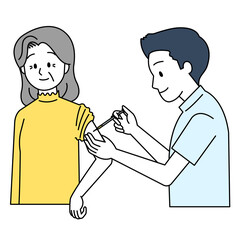 予防接種を受ける高齢女性