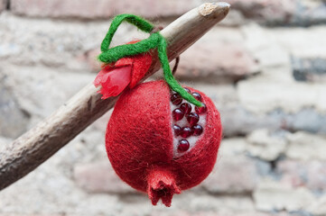Traditional georgian souvenir pomegranate fruit closeup
