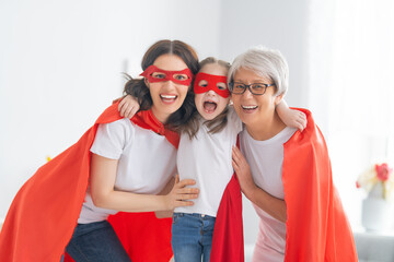 Family in Superhero costumes