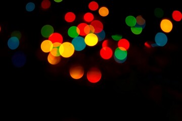 Abstract bokeh lights pattern background. New year celebration lights. Colorful circles.