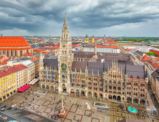 Obraz premium MUNICH, GERMANY - May 2nd, 2018: Aerial view to the central part of the city with the tower of Munich town hall