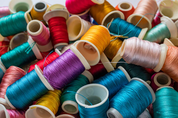 Colored thread spools used in the fabric and textile industry
