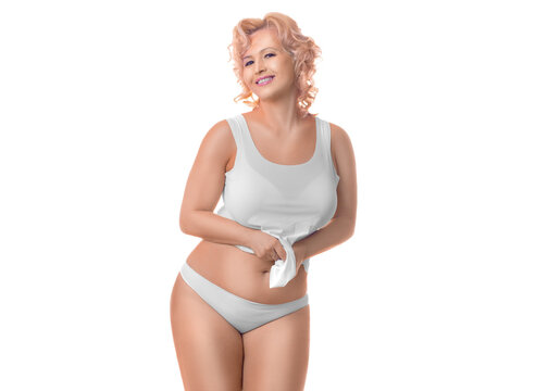 Smiling plus size womanover white background. After diet picture.