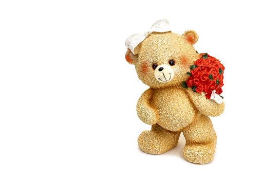 teddy bear with flowers on a white background