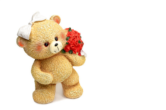 teddy bear with flowers on a white background
