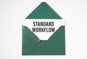 STANDARD WORKFLOW text on white paper in a green envelope.