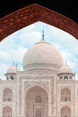 Fototapeta na wymiar Historic Building. View of the Taj Mahal Palace through the arch. Close up. Vertical