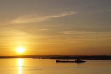 Fototapeta na wymiar picturesque sunset on the river