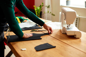 Step by step, woman dressmaker female measuring sewing pattern On Table