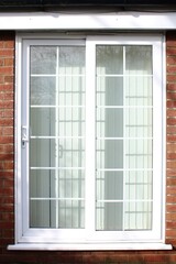 Fototapeta premium Georgian style white upvc double glazed sliding patio doors