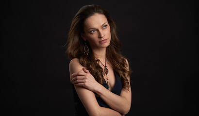 Naklejka premium Portrait of a beautiful woman with long brown hair