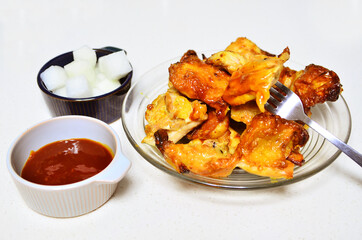 roasted chicken with seasonings, closeup - Korean favorite cuisine