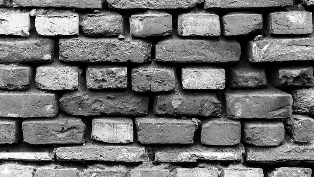 old brick wall in motion, black and white brick wall texture