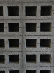 concrete wall with holes