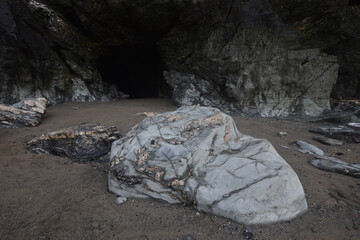The entrance to Merlin's Cave below Tintagel Castle Cornwall