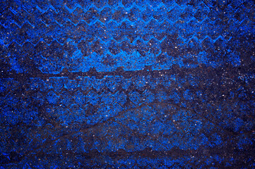 Texture, blue and black. paint, ornament on the asphalt