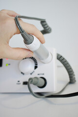 device for hardware manicure on a white background