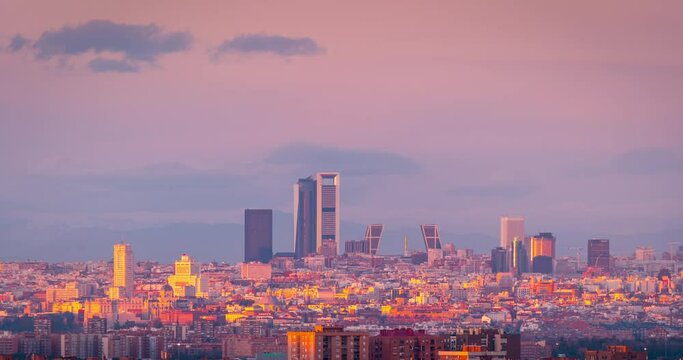 Madrid skyline south view during sunset timelapse day to night.