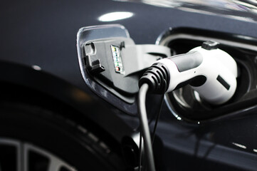 Fototapeta na wymiar New energy Is electric power for cars Charging a new battery Future car transportation.