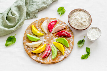 Cooking vegetables dumplings or ravioli, top view