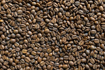 Background of fresh roasted coffee beans.