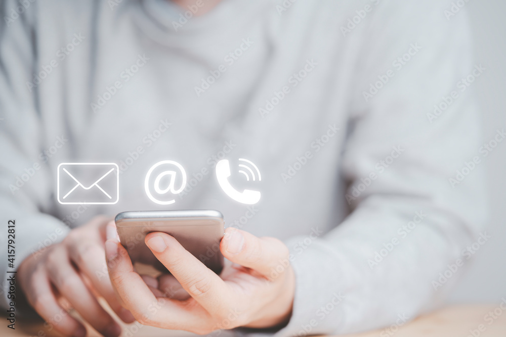 Poster businessman using smartphone for webpage business contact include e-mail address and telephone numbe
