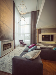 Luxury interior of flat. Living room with huge sofa. Modern design.