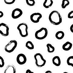 Seamless pattern with empty liquid shapes. Circle brushstrokes and rounded shapes. Vector hand drawn abstract ink background. Smears, circles, dots, splotches, blobs. Abstract wallpaper design