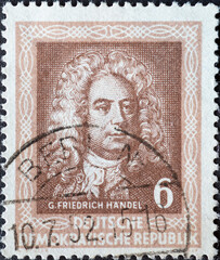 GERMANY, DDR - CIRCA 1952 : a postage stamp from Germany, GDR showing a portrait of the composer Georg Friedrich Handel. To the Handel Festival, Halle (Saale)