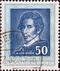 GERMANY, DDR - CIRCA 1952 : a postage stamp from Germany, GDR showing a portrait of the composer Carl Maria von Weber. To the Handel Festival, Halle (Saale)
