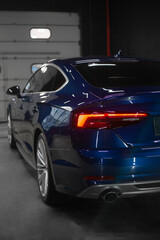Car detailing series : Closeup blue car lamp