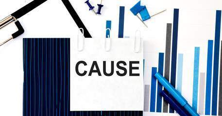 Notebook with Toolls and Notes about CAUSE on sticker ,concept