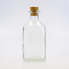 medium glass bottle with cork cap, transparent, sparkly and brilliant, for food, liquids, sauces, grain, condiments, seeds, preserves and candys, also for decoration