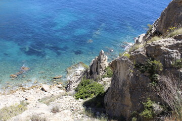 Beautiful views of the sea and the rocks from the top of a mountain.