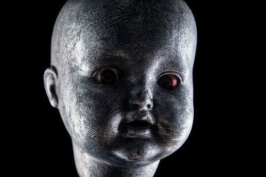Creepy doll in the dark