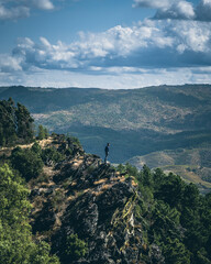 person on top of mountain