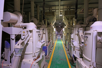 Advanced rice processing equipment in a grain processing plant, North China