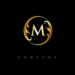 initial M logo with ornament