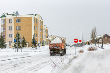 snow removal and removal by truck, including on official driveways and under prohibition signs
