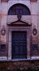 Door of old church Chiesa del Purgatorio in town Monopoli, Puglia , Italy.